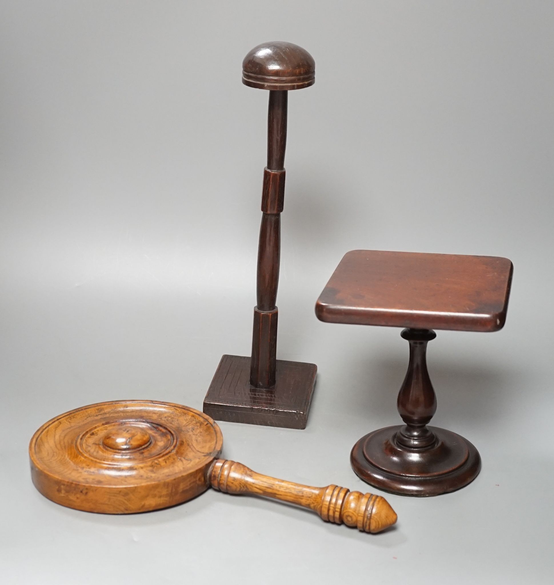 19th century Treen: mahogany candlestand, an oak hat or wig stand, 35.5cm and a burr oak hand mirror